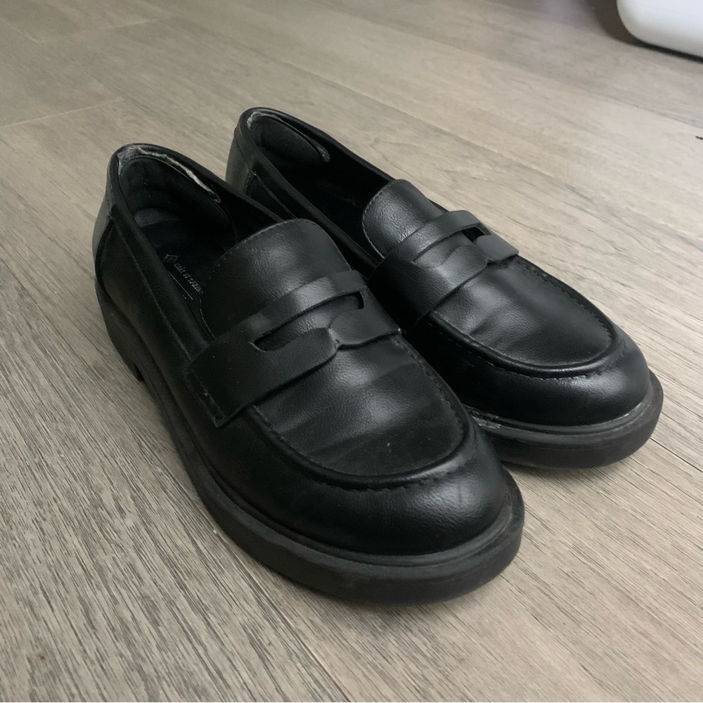 Black loafers